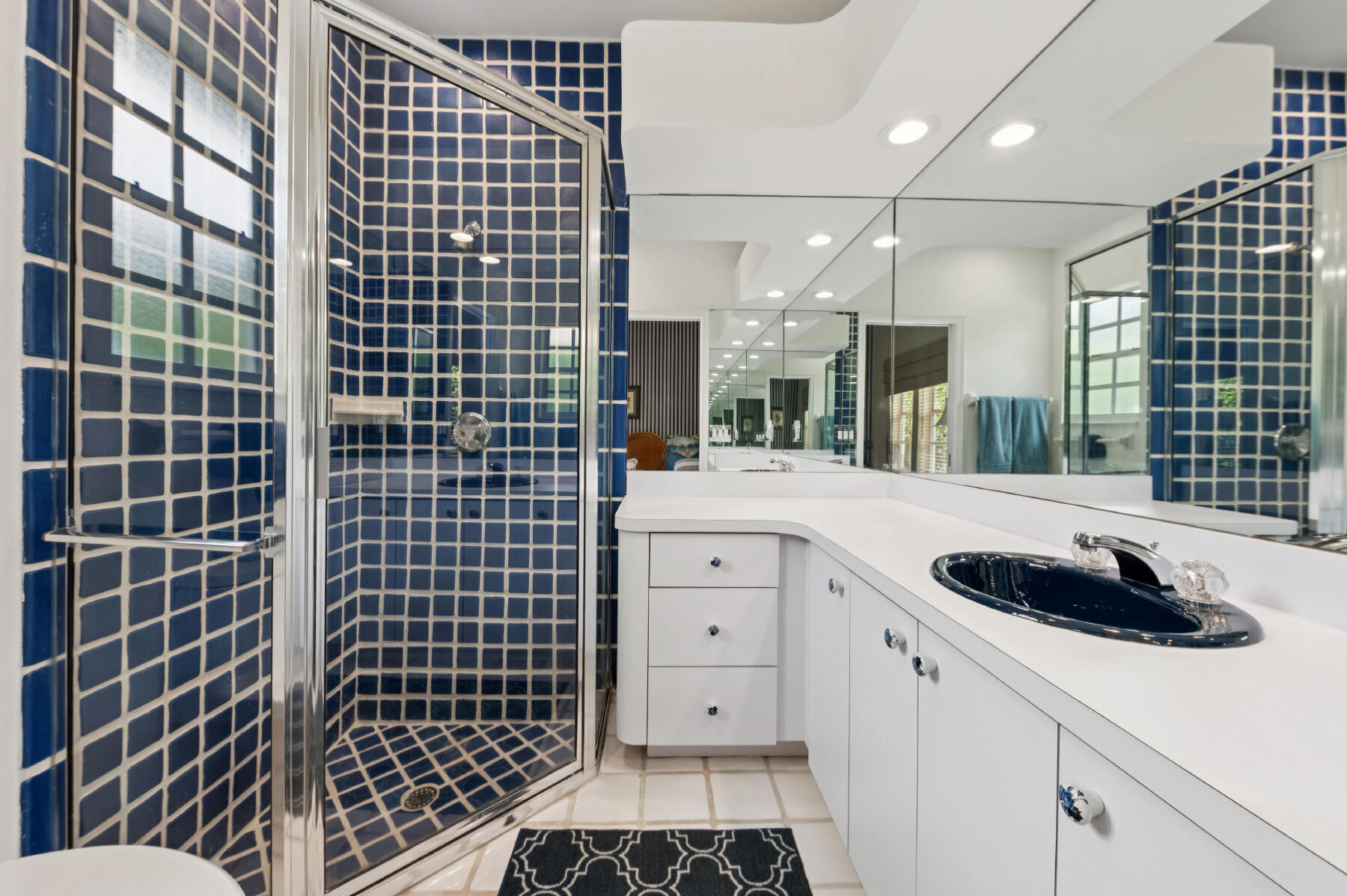 10403 Stonebridge Boulevard Boca Raton, FL 33498 - Photo 17 of 51 a bathroom with a sink toilet and shower