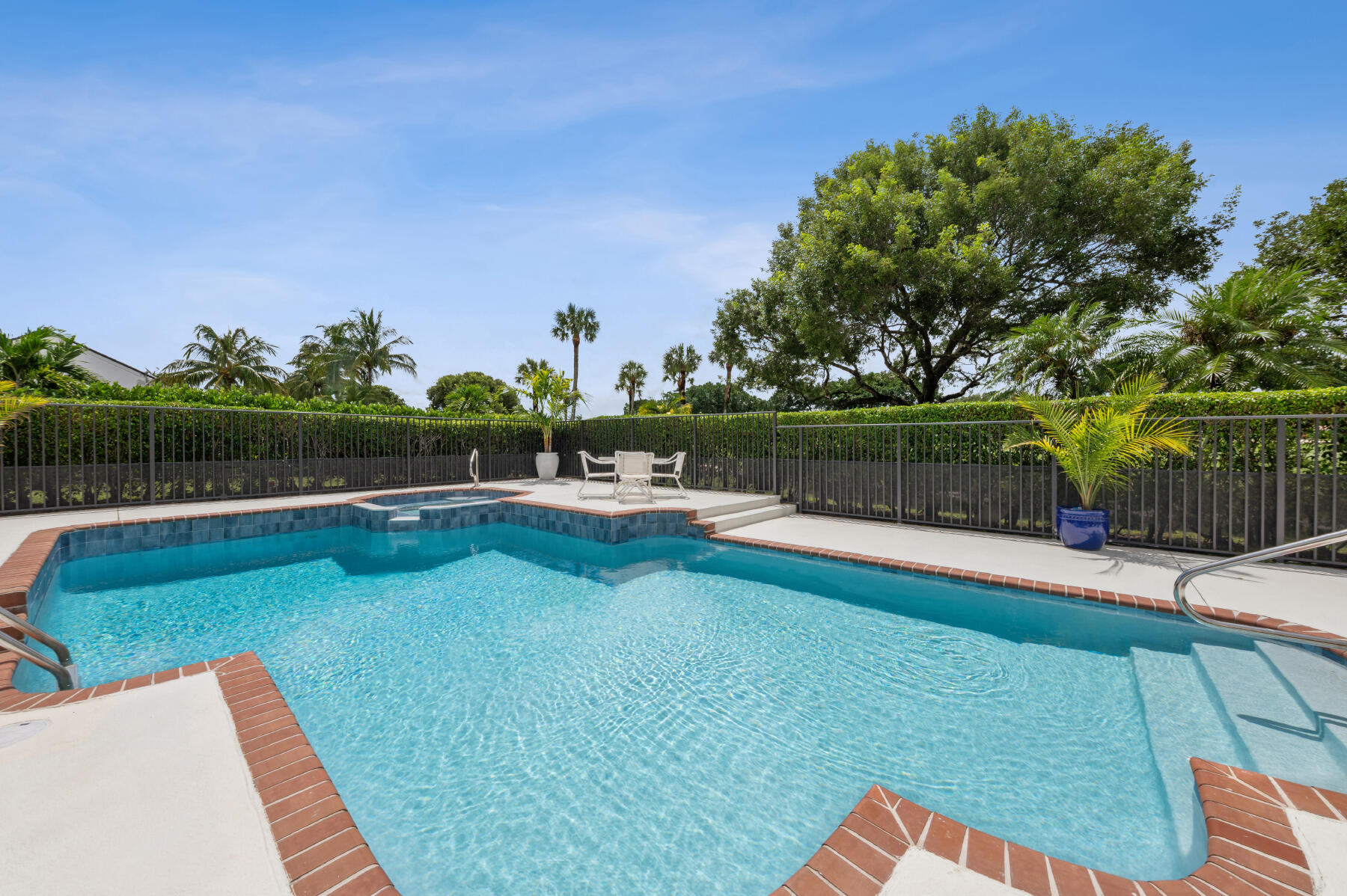 10403 Stonebridge Boulevard Boca Raton, FL 33498 - Photo 22 of 51 a view of a swimming pool with a lake view