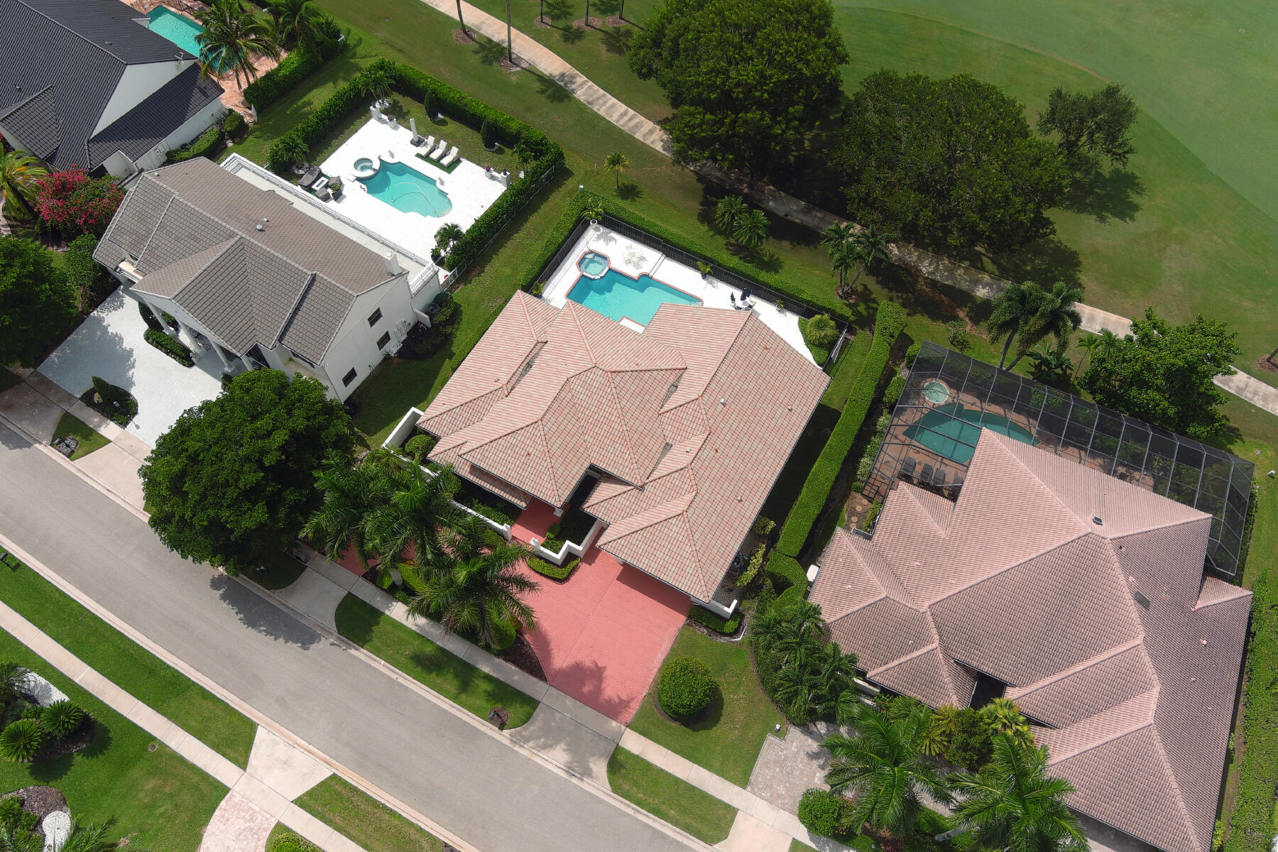 10403 Stonebridge Boulevard Boca Raton, FL 33498 - Photo 30 of 51 an aerial view of a house with a yard