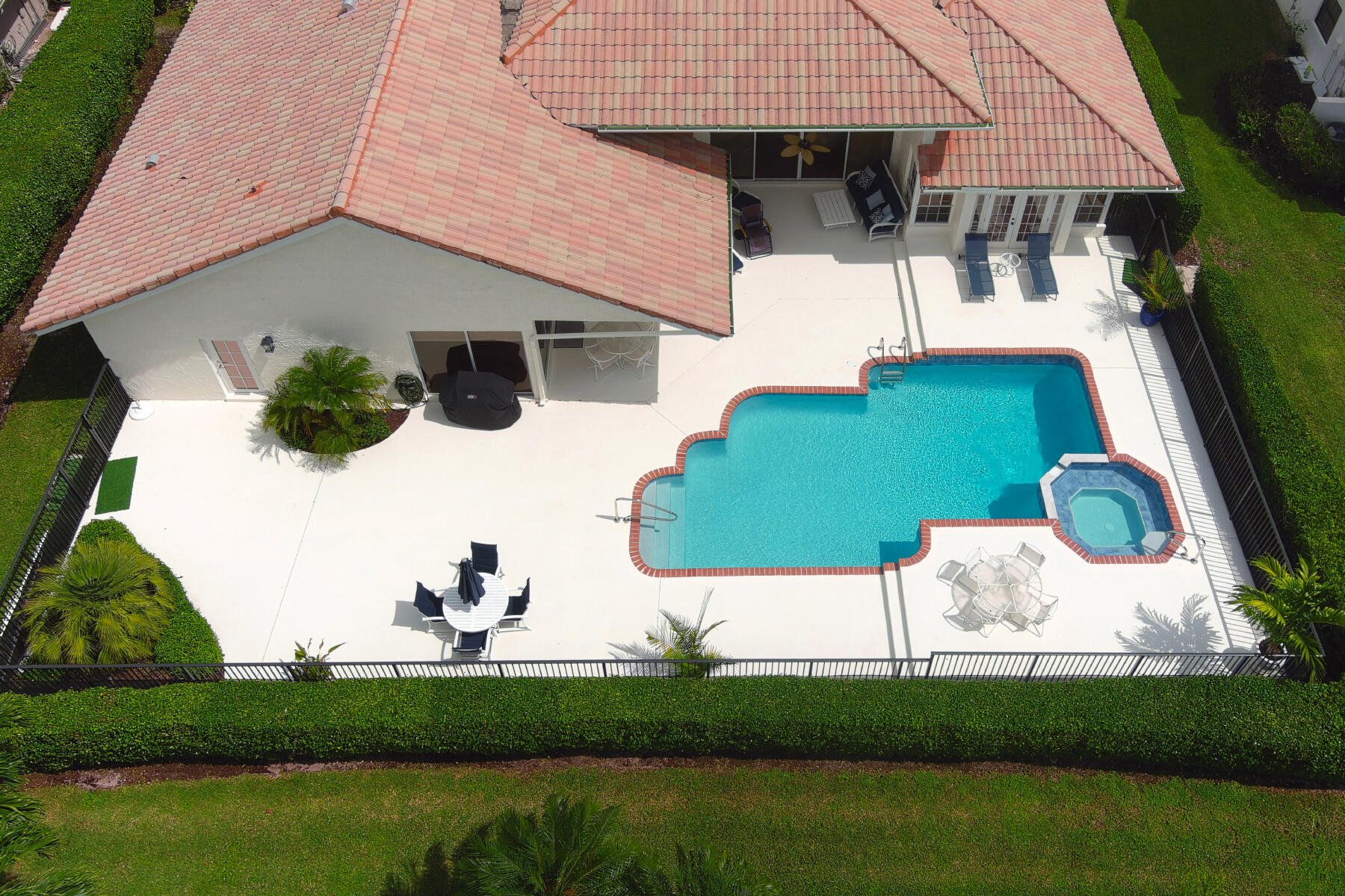 10403 Stonebridge Boulevard Boca Raton, FL 33498 - Photo 33 of 51 an aerial view of a house with a yard