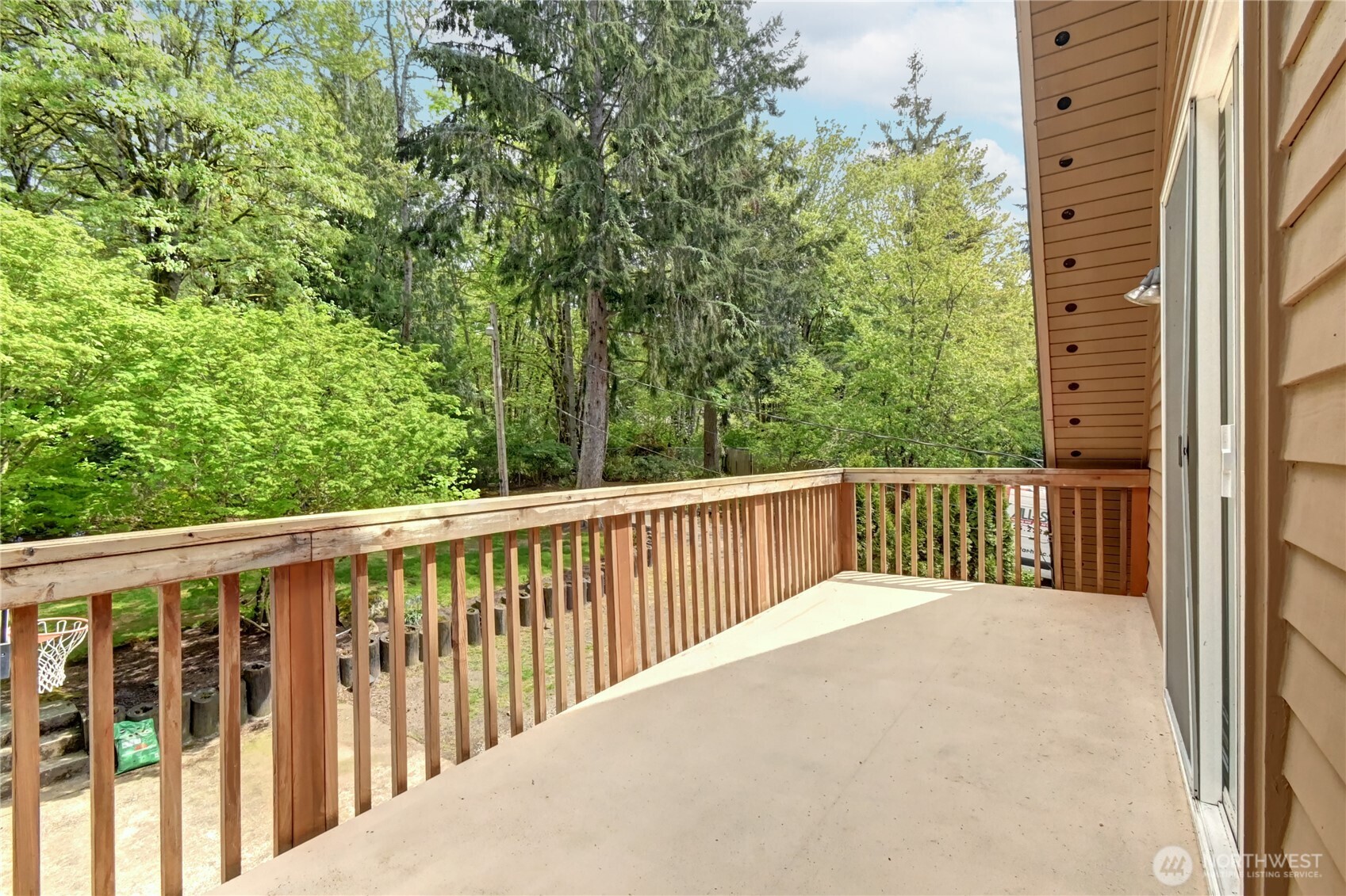 28539 Northeast Tolt Hill Road Carnation, WA 98014 - Photo 32 of 36 a balcony with trees in front of it
