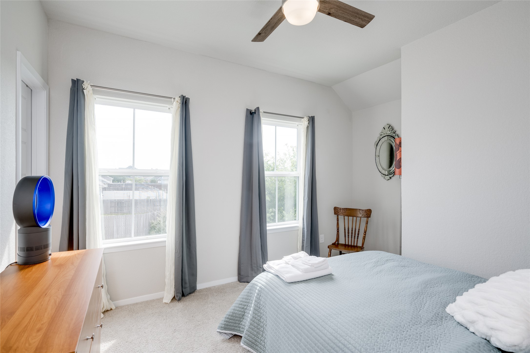 7948 Castelardo Place Round Rock, TX 78665 - Photo 15 of 32 a bedroom with a bed and a window