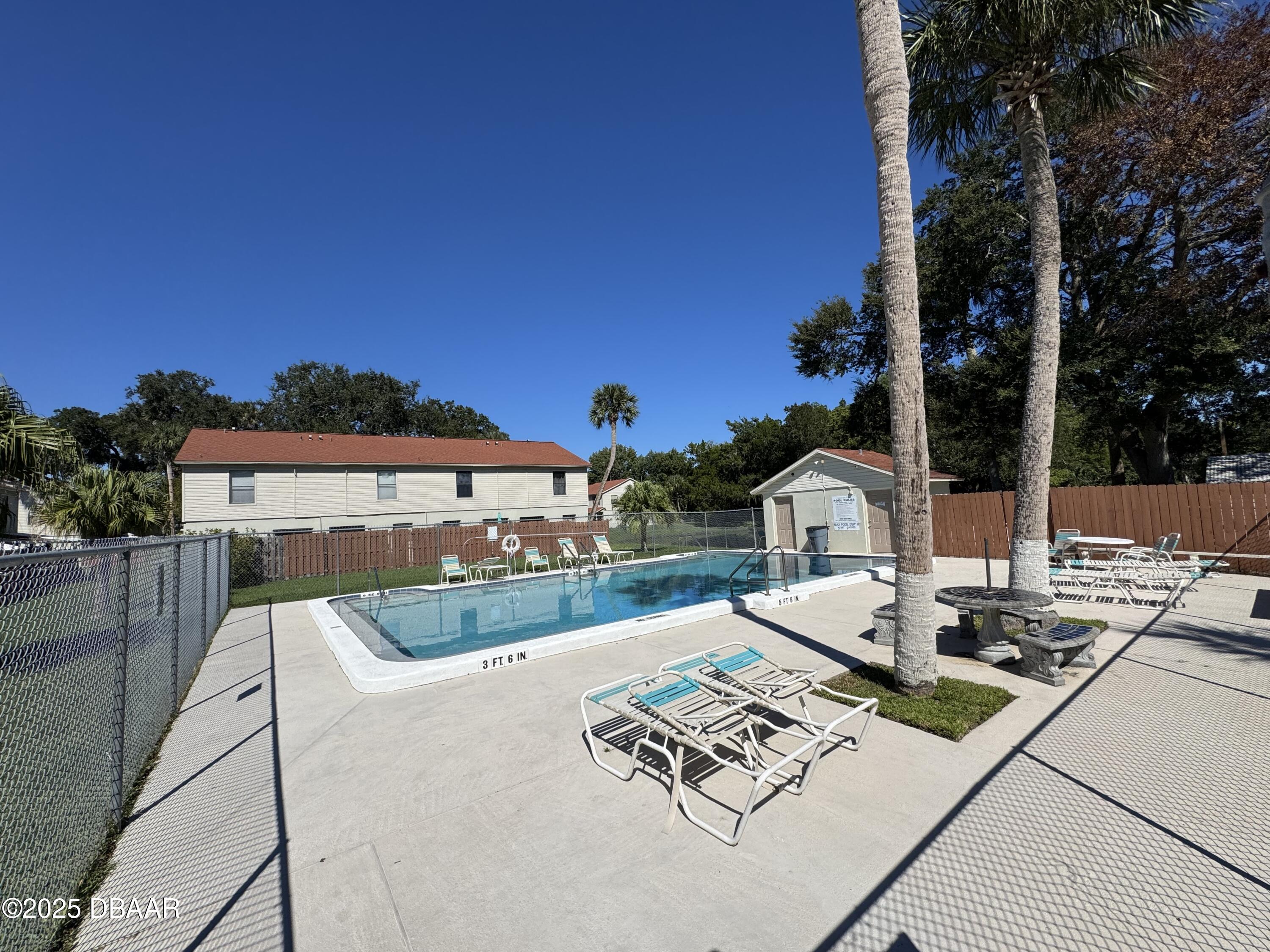 980 Canal View Boulevard, Unit E5 Port Orange, FL 32129 - Photo 10 of 10 a view of a house with outdoor space