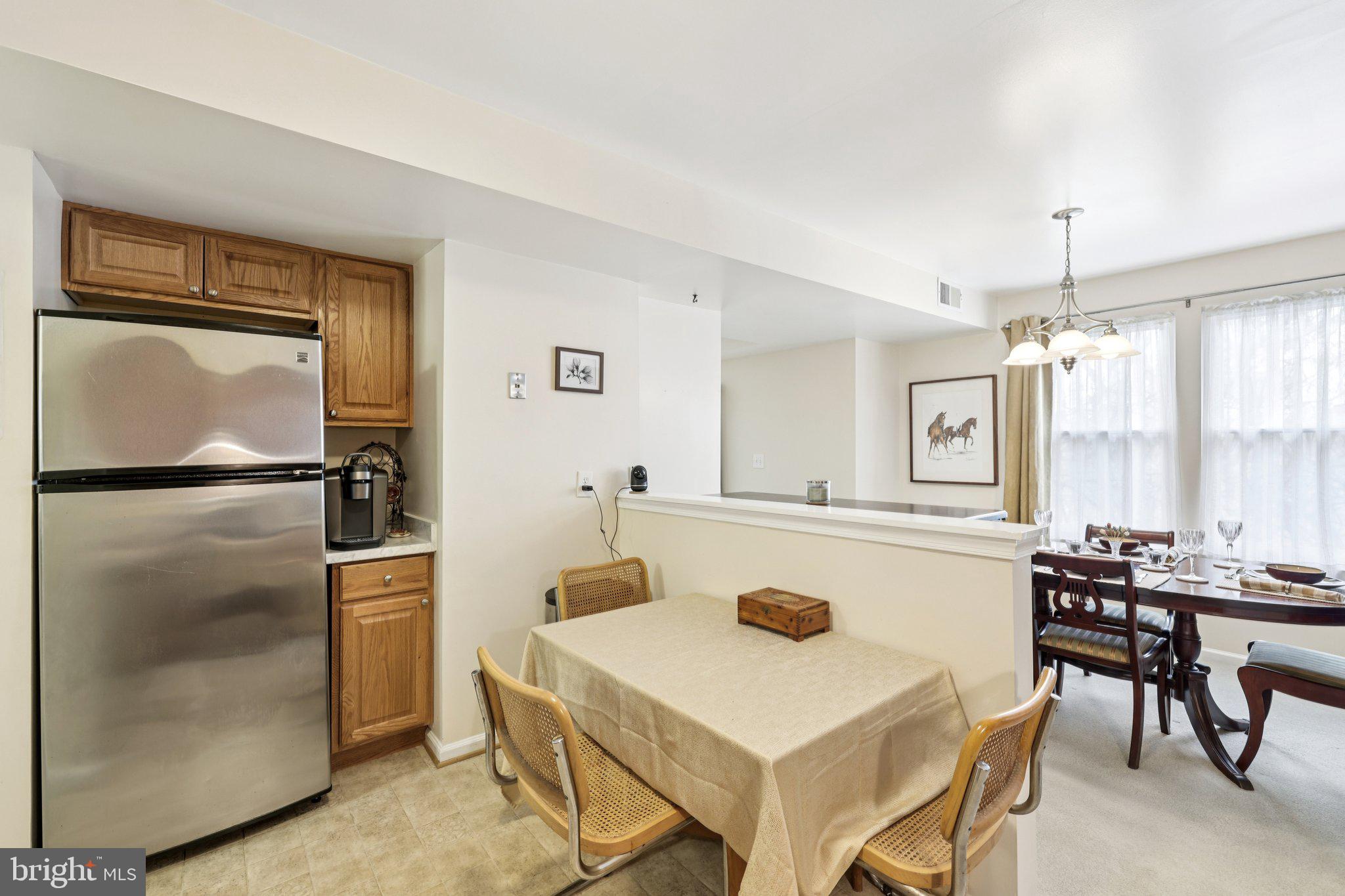 13 Pickering Court, Unit 1302 Germantown, MD 20874 - Photo 19 of 50 Coffee and wine bar.