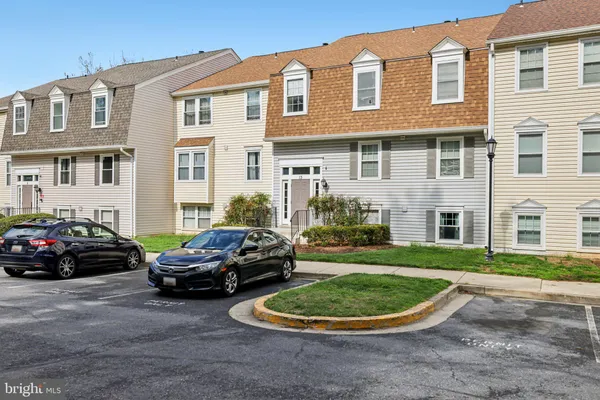 a car parked in front of a house