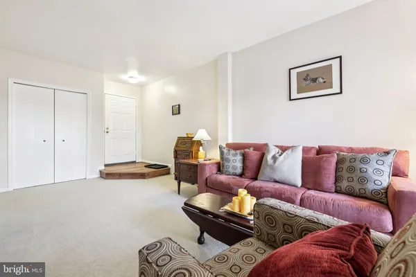 a living room with furniture and a couch