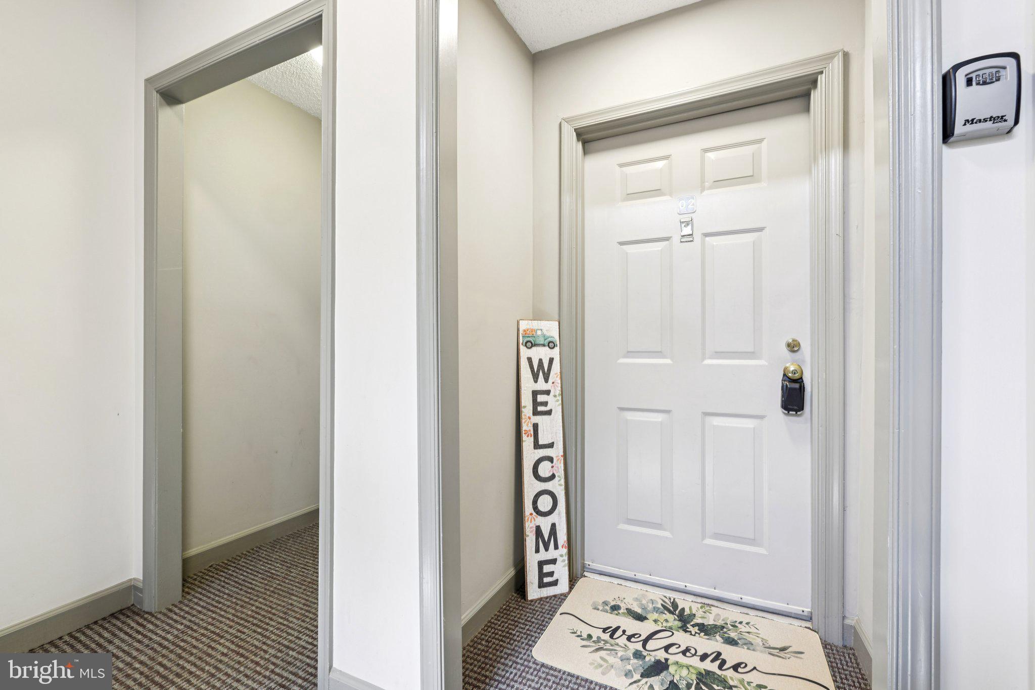 13 Pickering Court, Unit 1302 Germantown, MD 20874 - Photo 10 of 50 Inviting, covered front entry.
