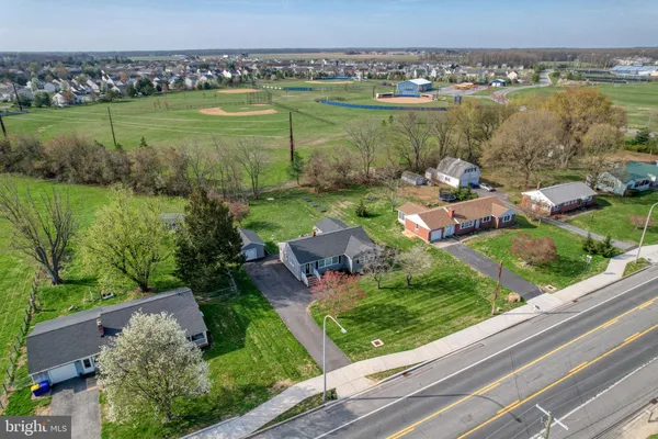 a view of a lake with a big yard