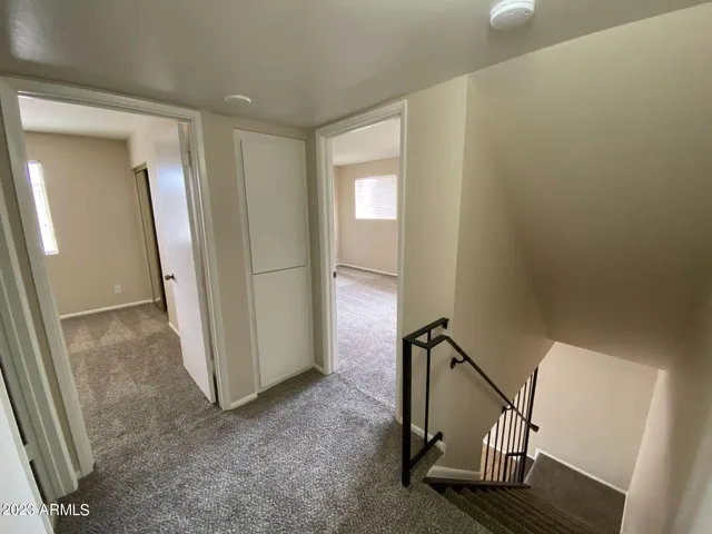 an entryway with a floor to ceiling window