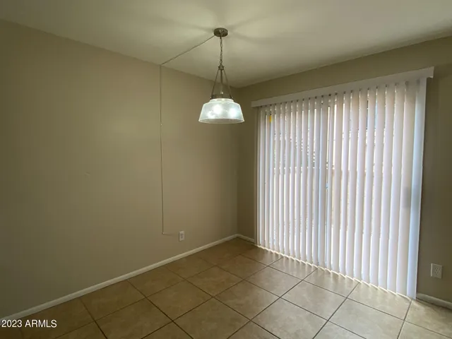 a view of a room with windows