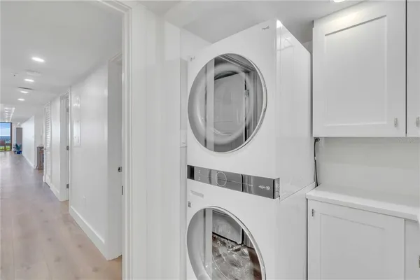 a view of a backyard with plants and outdoor seating