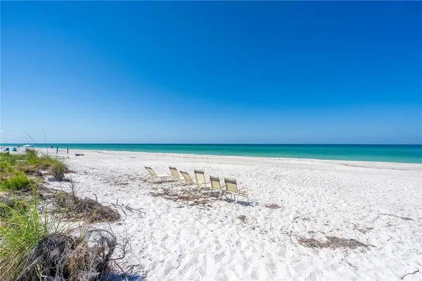 a view of swimming pool with lounge chair