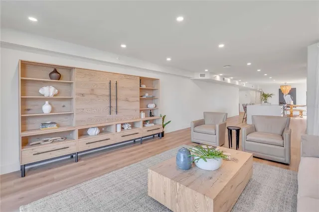 a living room with furniture and a table