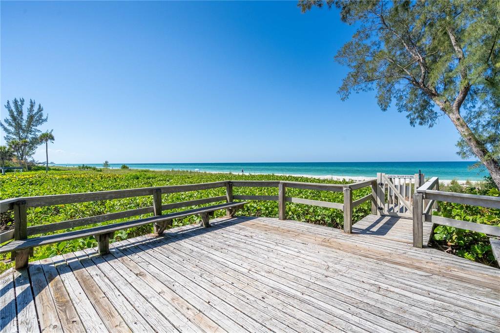 5611 Gulf Of Mexico Drive, Unit 1 Longboat Key, FL 34228 - Photo 31 of 39 a view of swimming pool with lounge chair