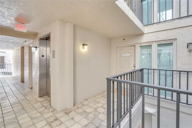 a view of a bunch of flowers in a balcony