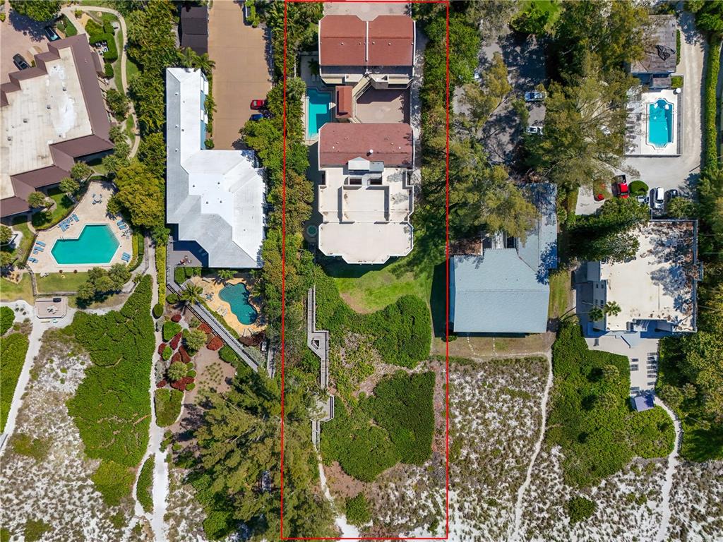5611 Gulf Of Mexico Drive, Unit 1 Longboat Key, FL 34228 - Photo 36 of 39 an aerial view of a house
