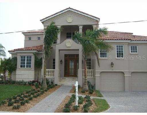 550 Yardarm Lane Longboat Key, FL 34228 - Photo 1 of 1 front view of a house with a yard