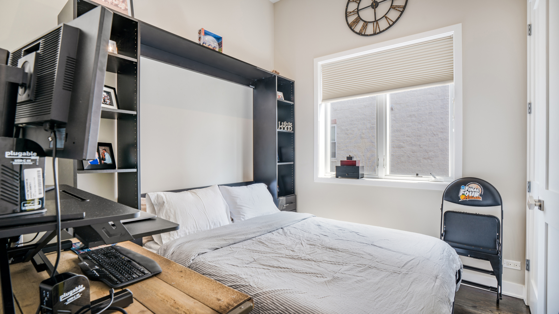 2133 West Rice Street, Unit 3 Chicago, IL 60622 - Photo 15 of 24 a bedroom with a bed and a window