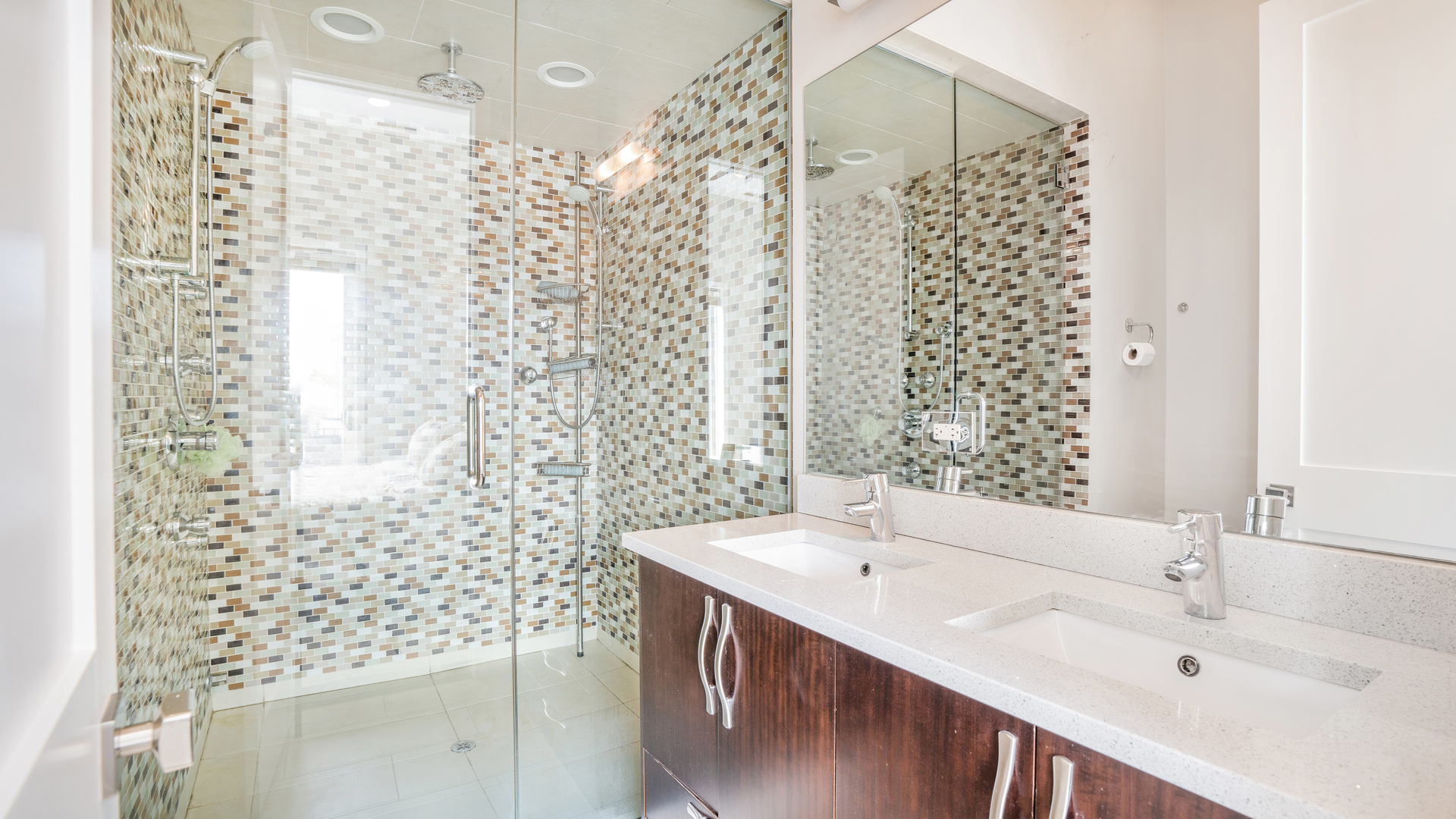 2133 West Rice Street, Unit 3 Chicago, IL 60622 - Photo 17 of 24 a bathroom with a double vanity sink mirror and shower