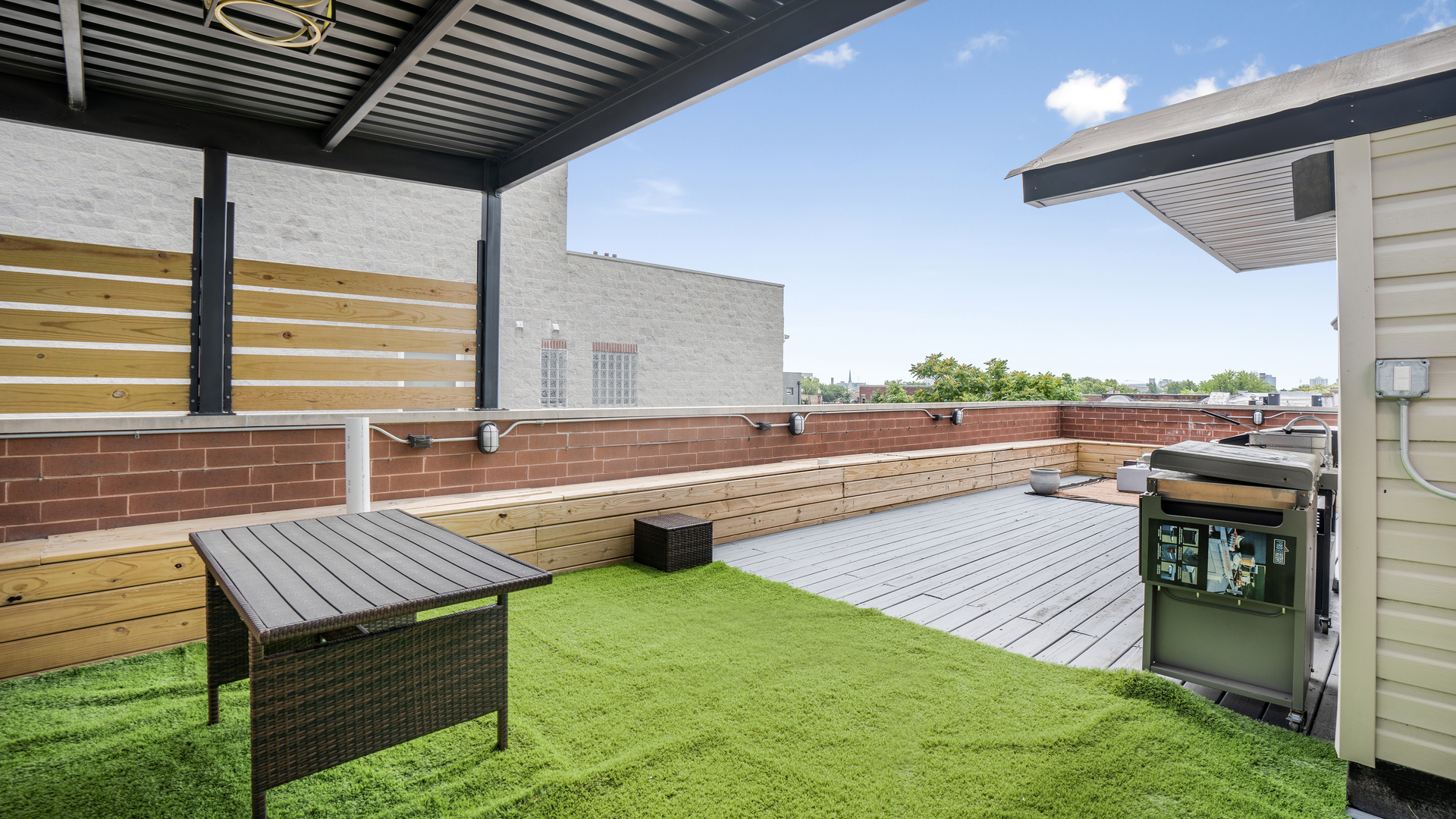 2133 West Rice Street, Unit 3 Chicago, IL 60622 - Photo 22 of 24 a view of a backyard with sitting area