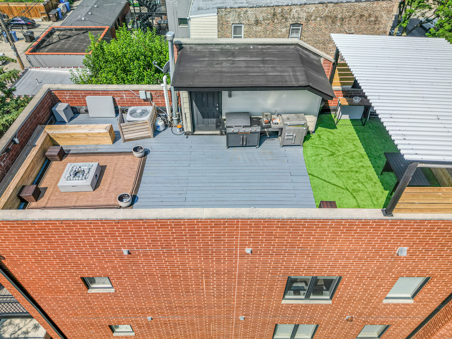2133 West Rice Street, Unit 3 Chicago, IL 60622 - Photo 24 of 24 aerial view of a house with table and chairs