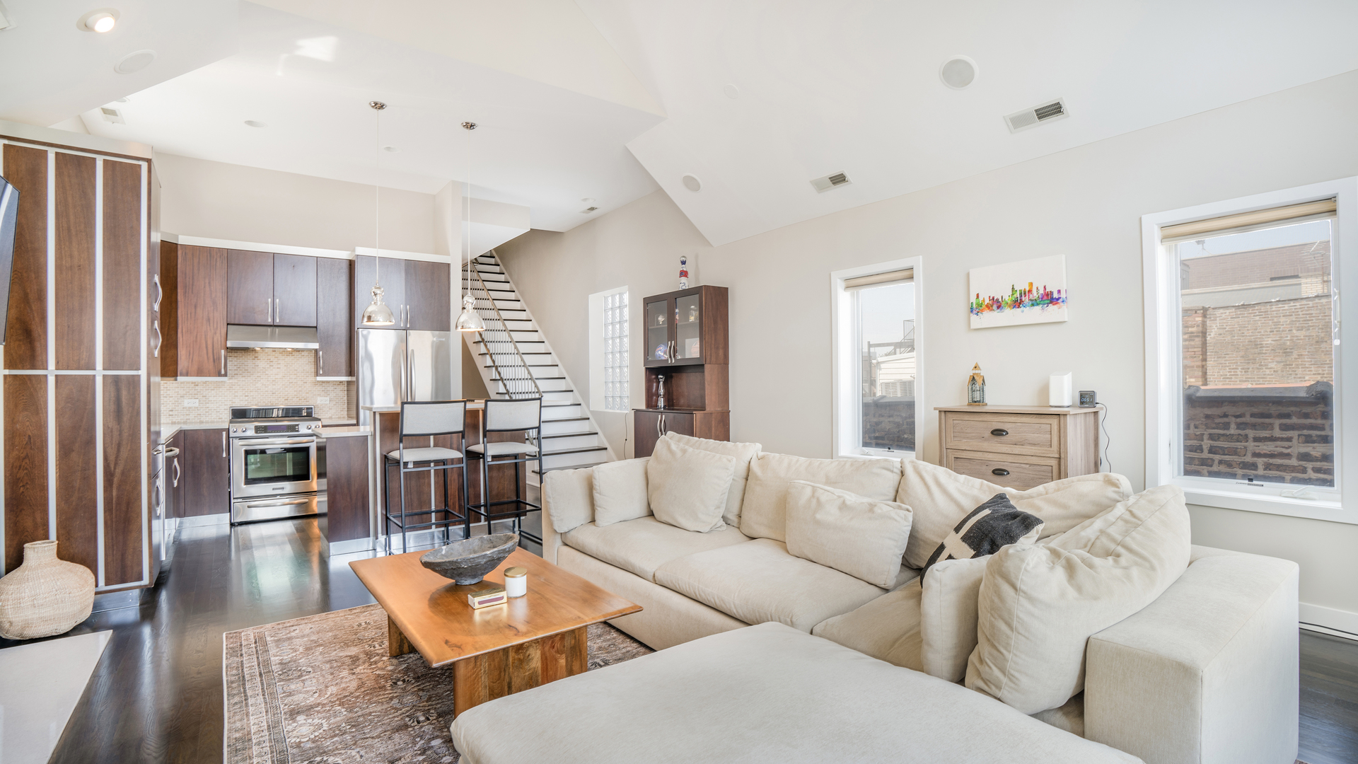 2133 West Rice Street, Unit 3 Chicago, IL 60622 - Photo 10 of 24 a living room with furniture and a large window