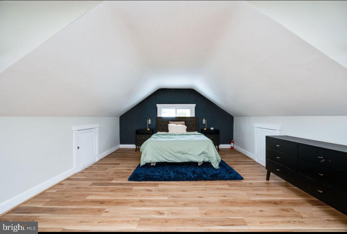 2054 Cleveland Avenue Reading, PA 19609 - Photo 19 of 27 a living room with a bed and a dresser