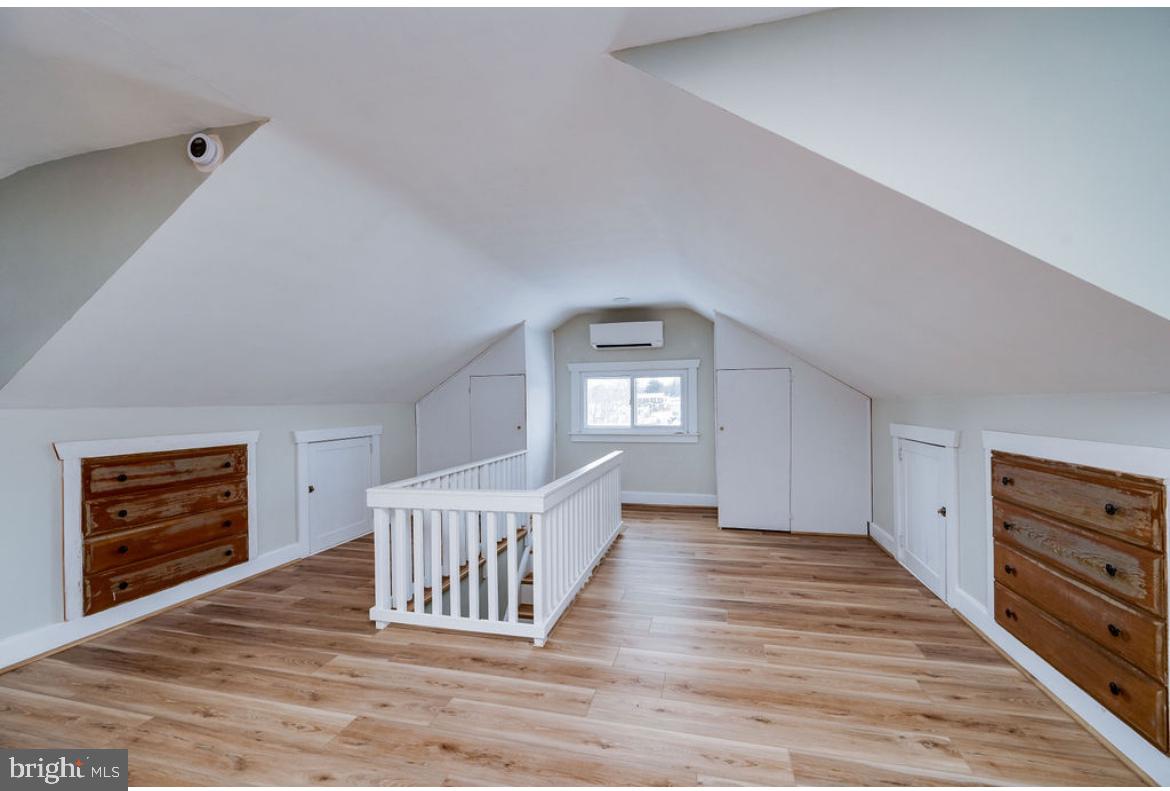 2054 Cleveland Avenue Reading, PA 19609 - Photo 21 of 27 a view of an empty room and window with wooden floor