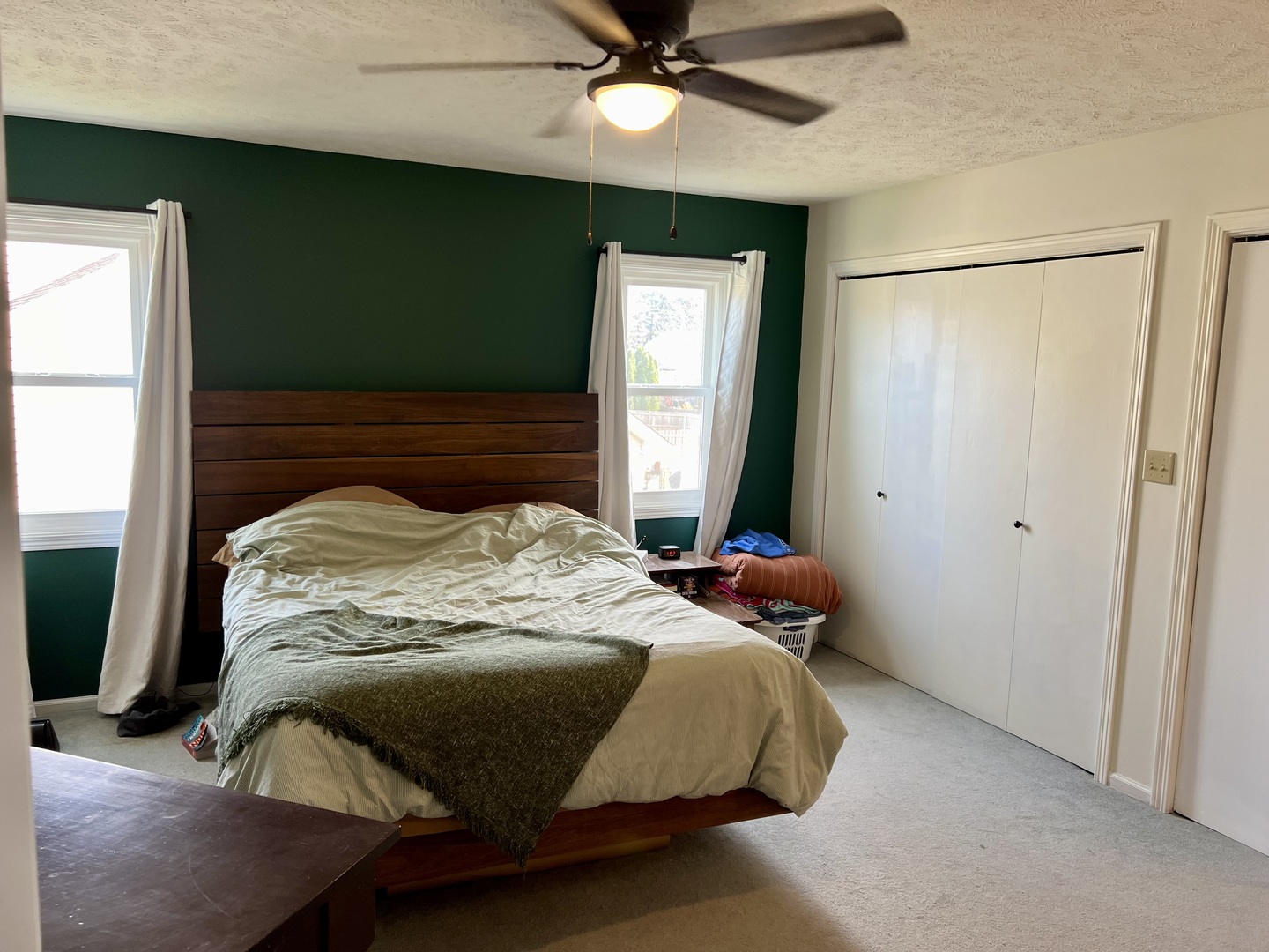 1090 Pickwick Drive Rochelle, IL 61068 - Photo 23 of 30 a bedroom with a bed and a chandelier