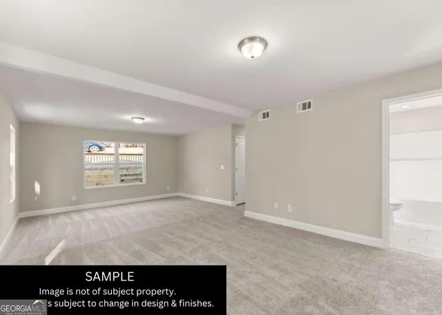 a view of an empty room and window