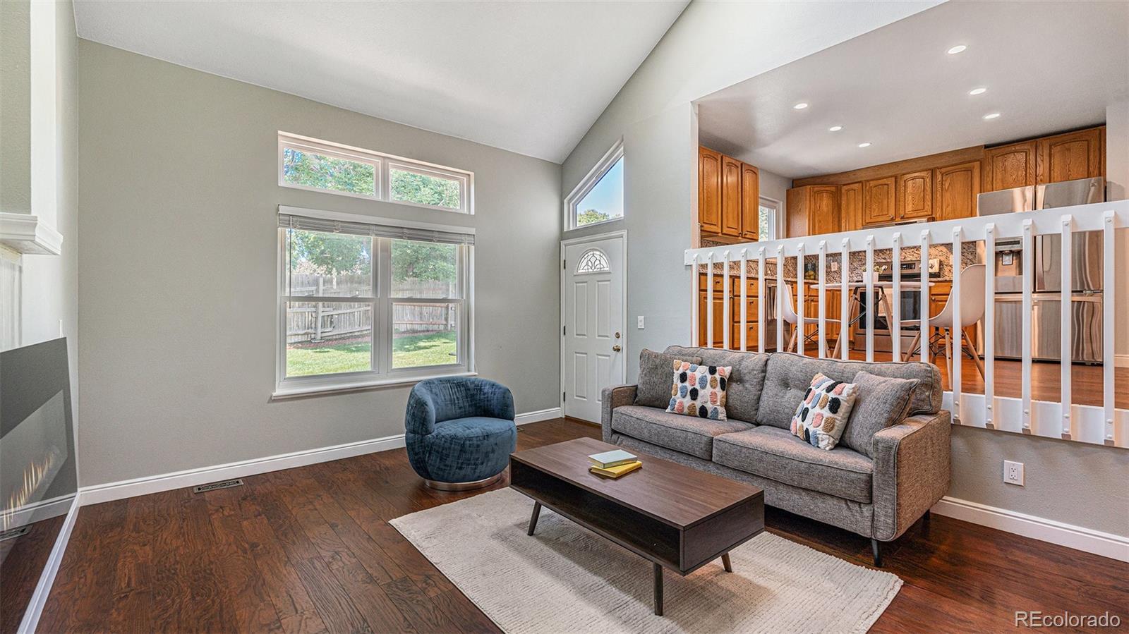 9897 Independence Street Westminster, CO 80021 - Photo 11 of 29 a living room with furniture and a window