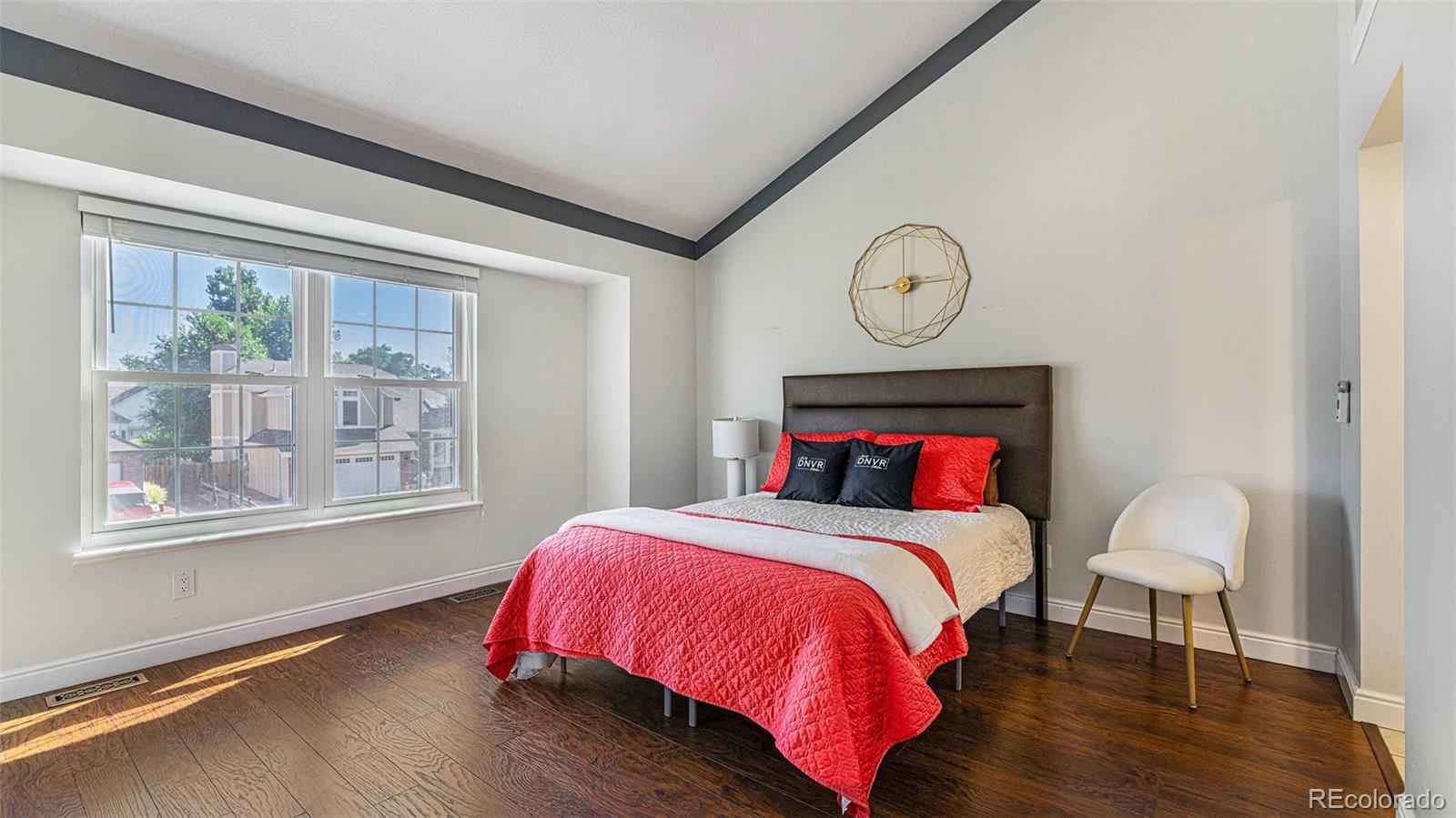 9897 Independence Street Westminster, CO 80021 - Photo 12 of 29 a bedroom with bed and a window