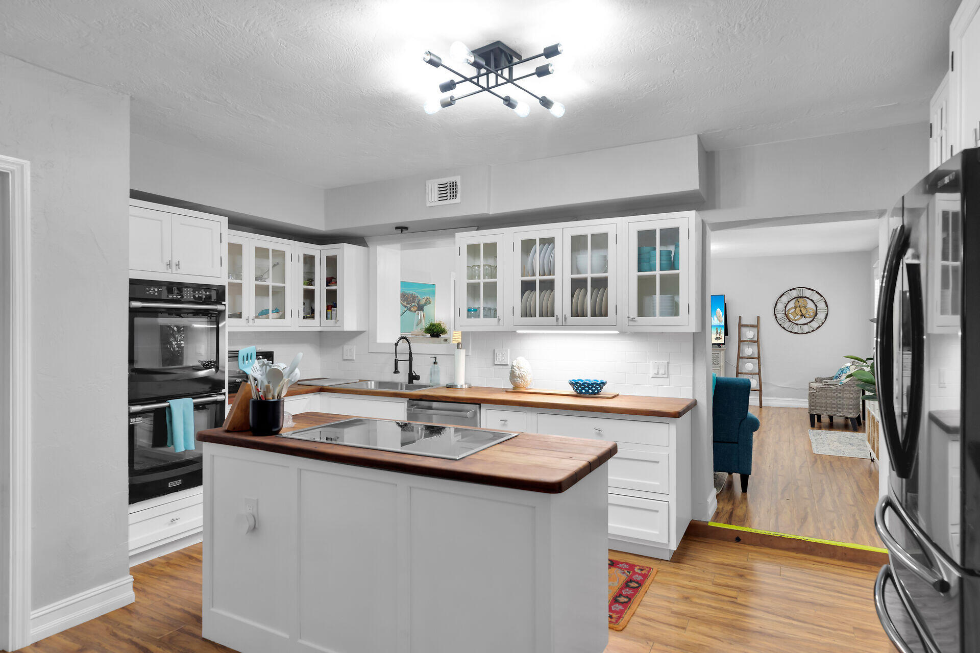 230 Key Honey Road Tavernier, FL 33070 - Photo 11 of 38 a kitchen with stainless steel appliances a sink stove and refrigerator