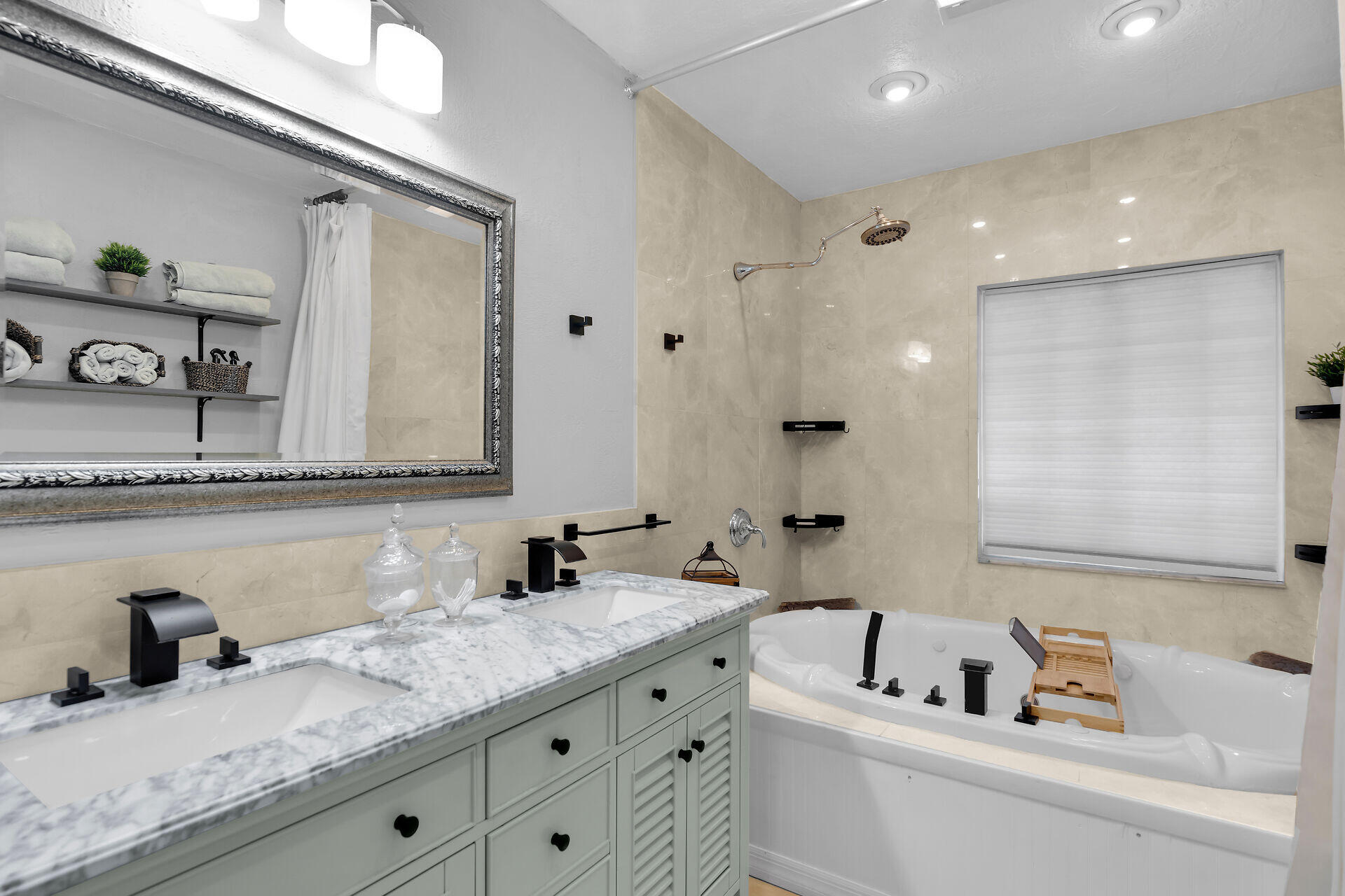 230 Key Honey Road Tavernier, FL 33070 - Photo 19 of 38 a bathroom with a granite countertop double vanity sink and mirror