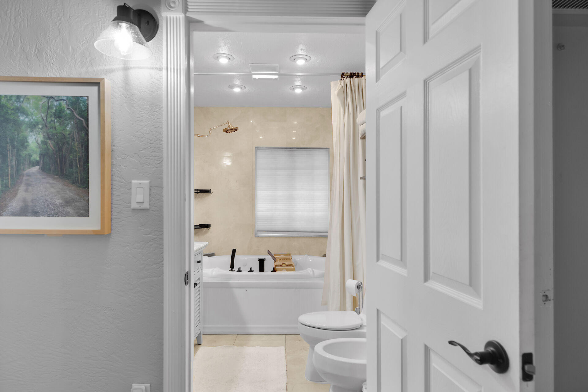 230 Key Honey Road Tavernier, FL 33070 - Photo 20 of 38 a bathroom with a sink a toilet and shower