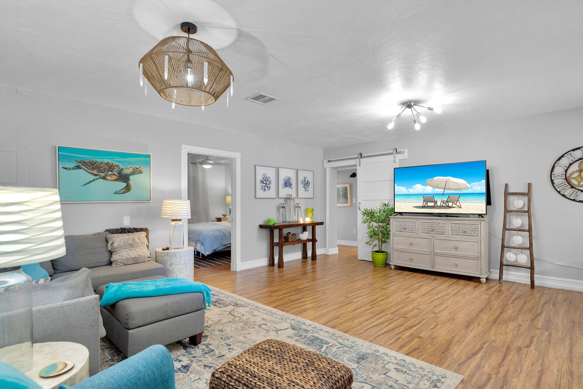 230 Key Honey Road Tavernier, FL 33070 - Photo 6 of 38 a living room with furniture and a flat screen tv
