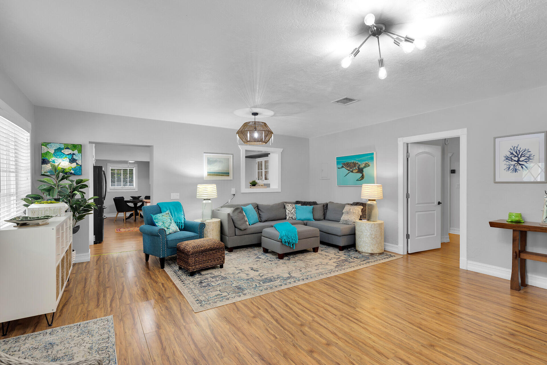 230 Key Honey Road Tavernier, FL 33070 - Photo 7 of 38 a living room with furniture and a chandelier