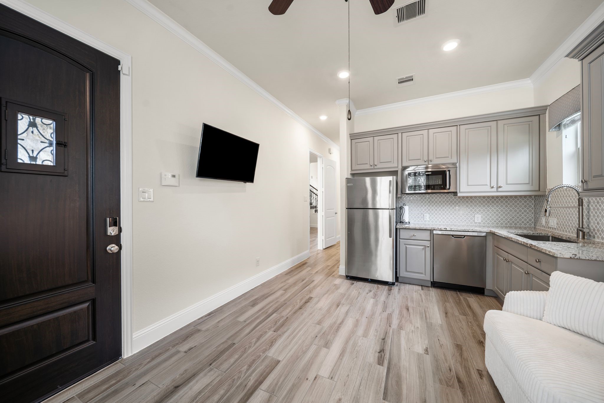 18307 Whistling Hills Road Cypress, TX 77433 - Photo 16 of 38 Located at the front of the home with both interior access and a separate exterior entrance, the Next Gen Suite offers exceptional flexibility and privacy.