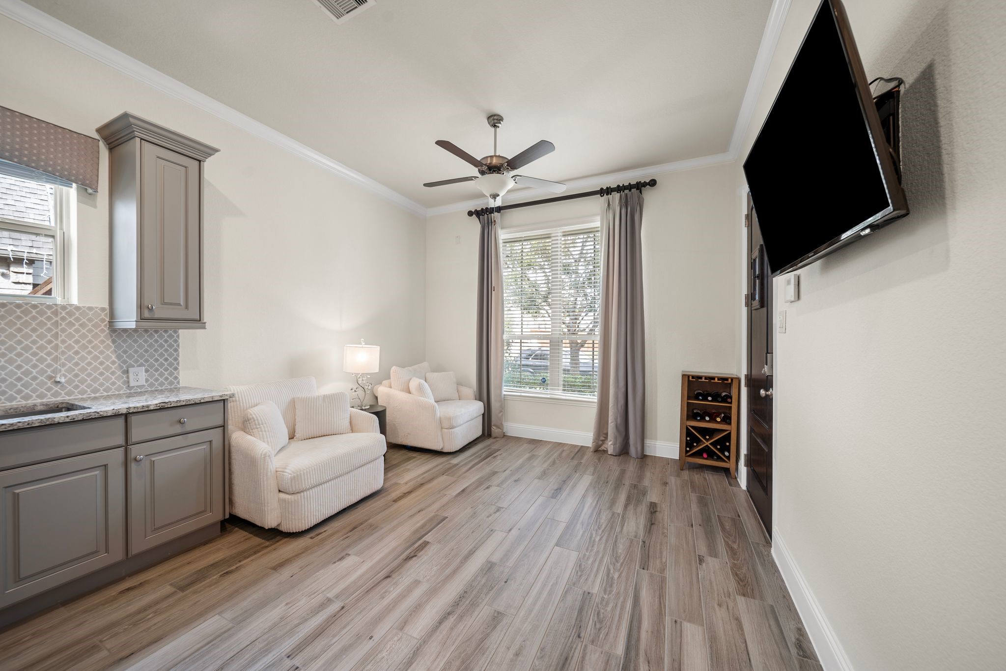 18307 Whistling Hills Road Cypress, TX 77433 - Photo 17 of 38 This is another view of the suite's living room.