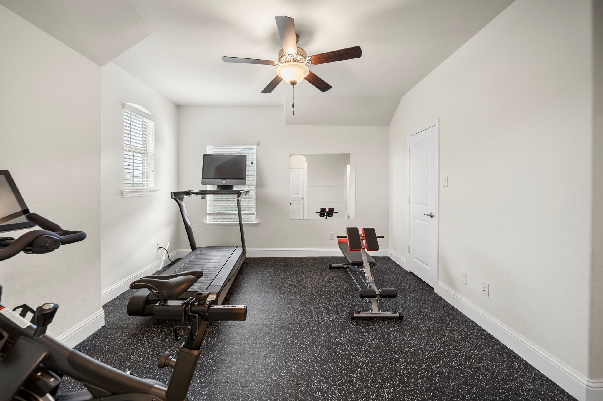 18307 Whistling Hills Road Cypress, TX 77433 - Photo 27 of 38 One of the bedrooms upstairs has been converted into a gym but can easily be converted back. (Only the floors have been changed.)