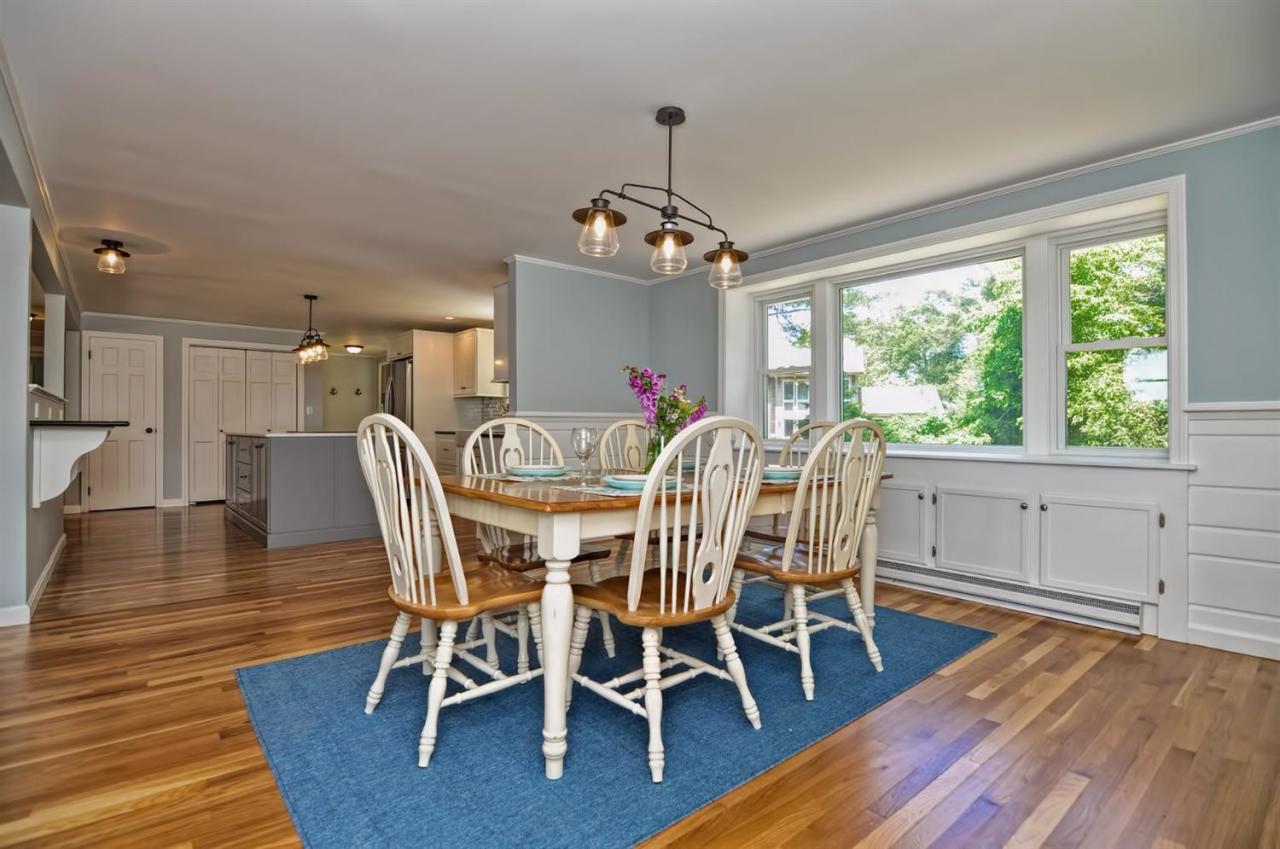 56 Elgin Road Pocasset, MA 02559 - Photo 11 of 35 a view of a dining room with furniture window and wooden floor