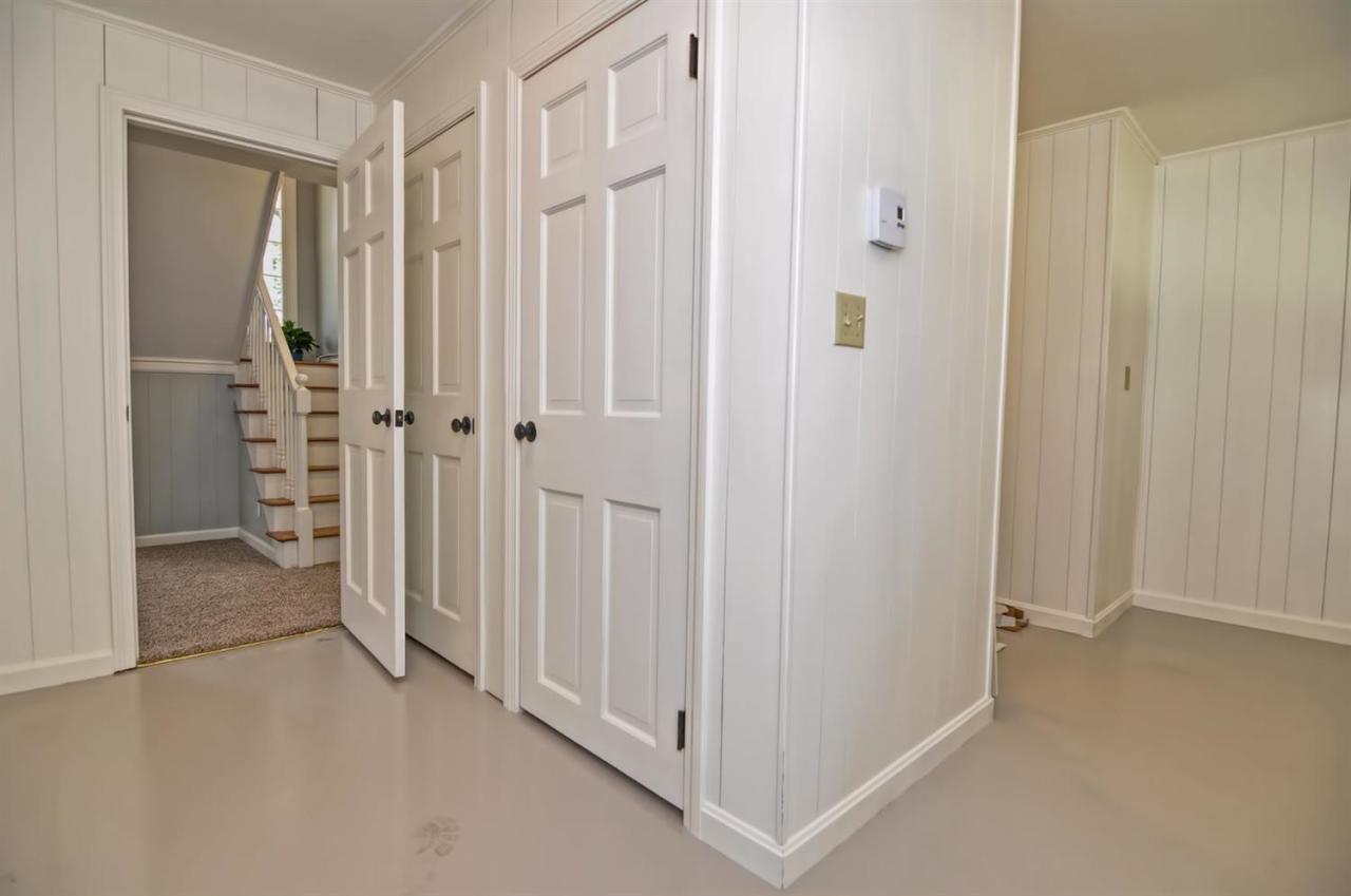 56 Elgin Road Pocasset, MA 02559 - Photo 30 of 35 a view of a livingroom with wooden floor