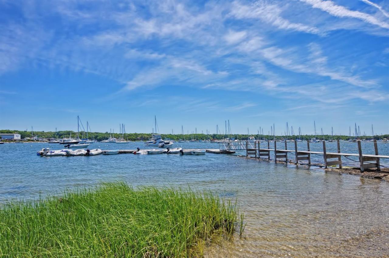 56 Elgin Road Pocasset, MA 02559 - Photo 34 of 35 a view of a lake with houses