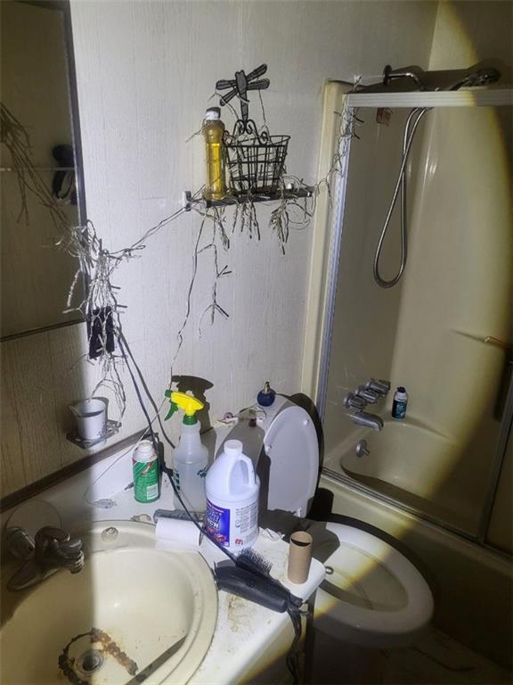 546 Alton Lawson Road Adrian, GA 31002 - Photo 23 of 29 a bathroom with a sink toilet and shower