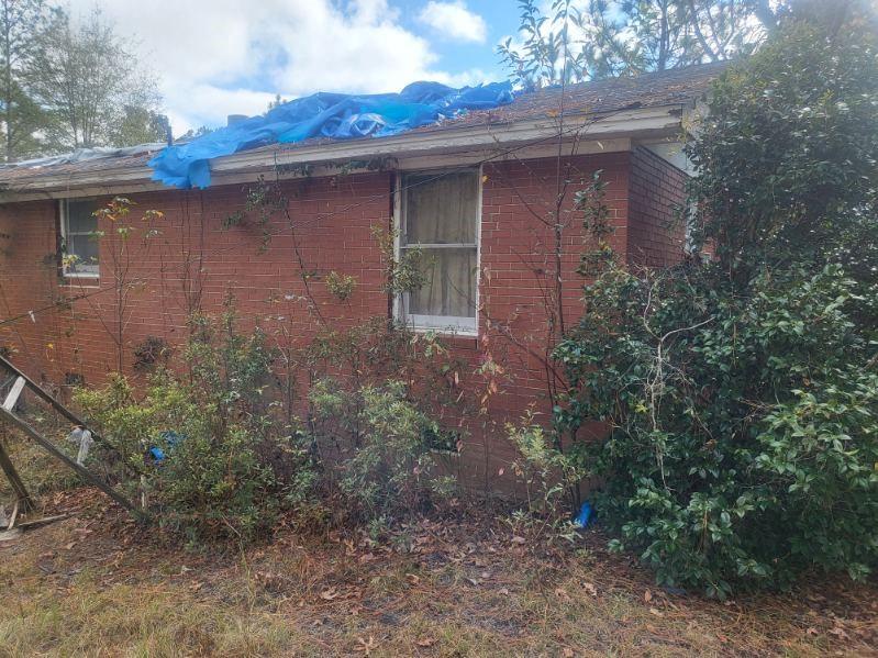 546 Alton Lawson Road Adrian, GA 31002 - Photo 5 of 29 a view of a house with a yard