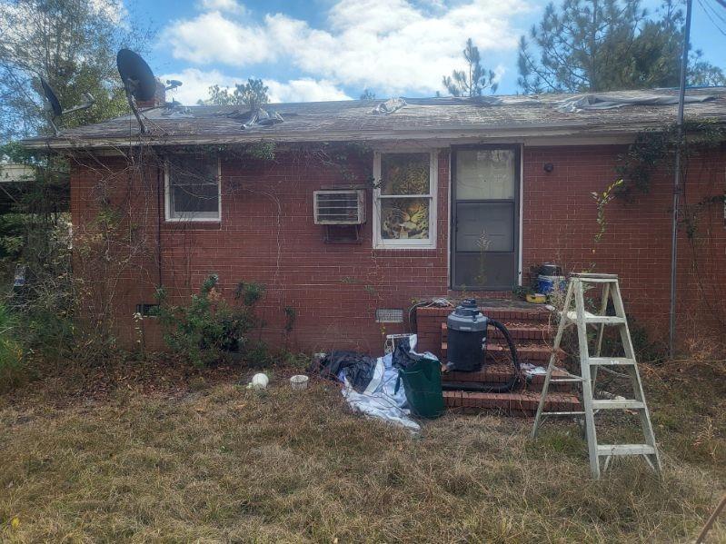 546 Alton Lawson Road Adrian, GA 31002 - Photo 6 of 29 a view of backyard with outdoor seating and plants
