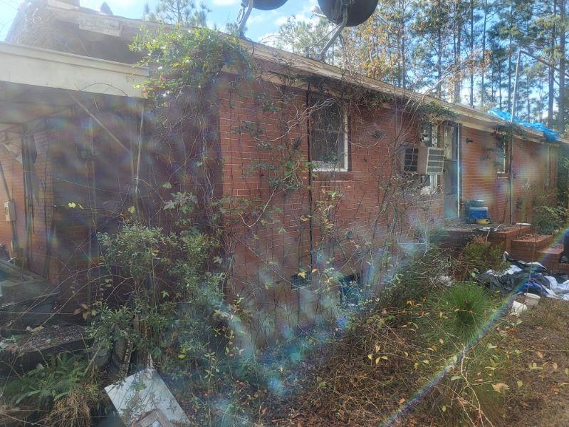 546 Alton Lawson Road Adrian, GA 31002 - Photo 8 of 29 a backyard of a house with lots of green space