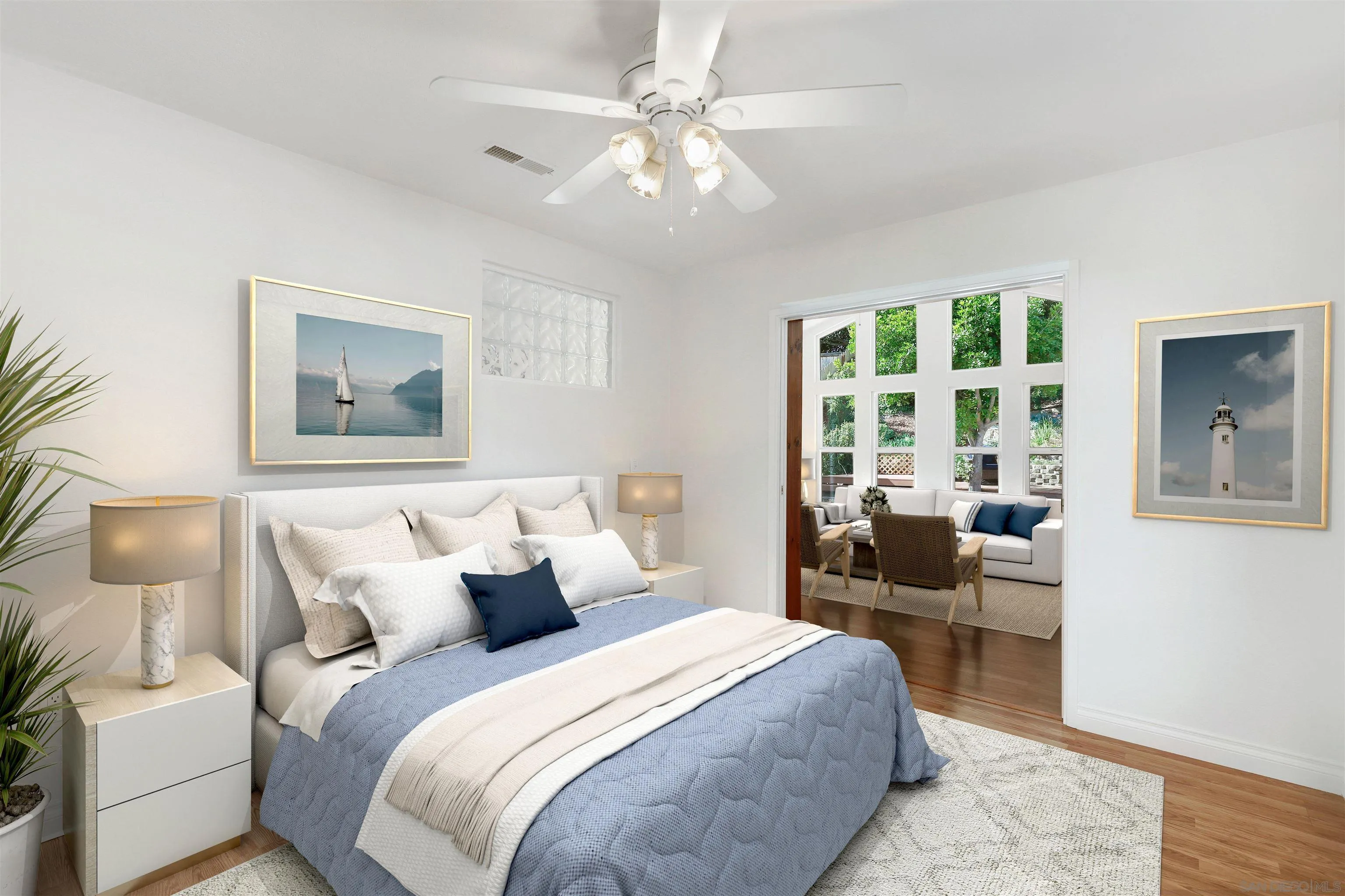 4716 Sunrise Ridge Oceanside, CA 92056 - Photo 18 of 31 a bedroom with a large bed and a couch
