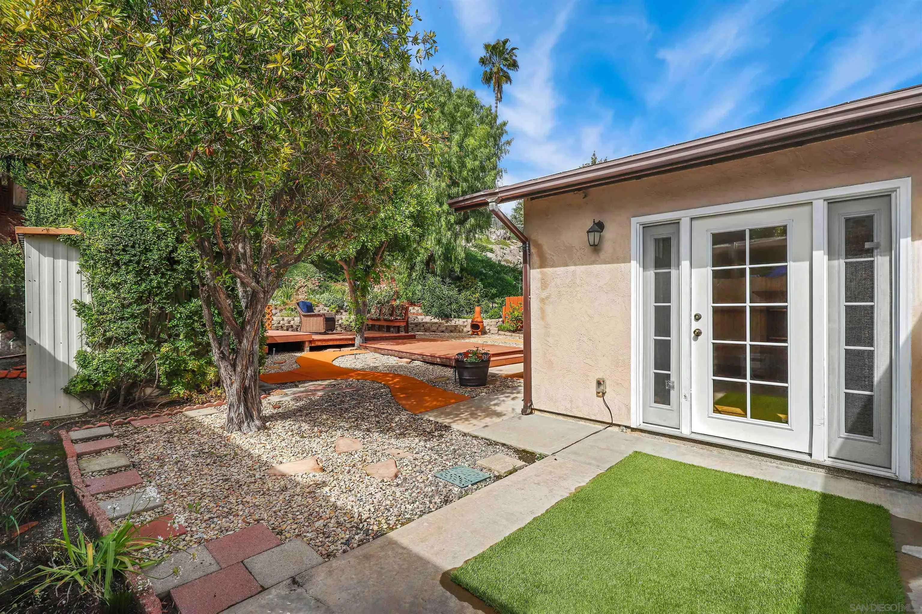 4716 Sunrise Ridge Oceanside, CA 92056 - Photo 25 of 31 a front view of a house with a yard