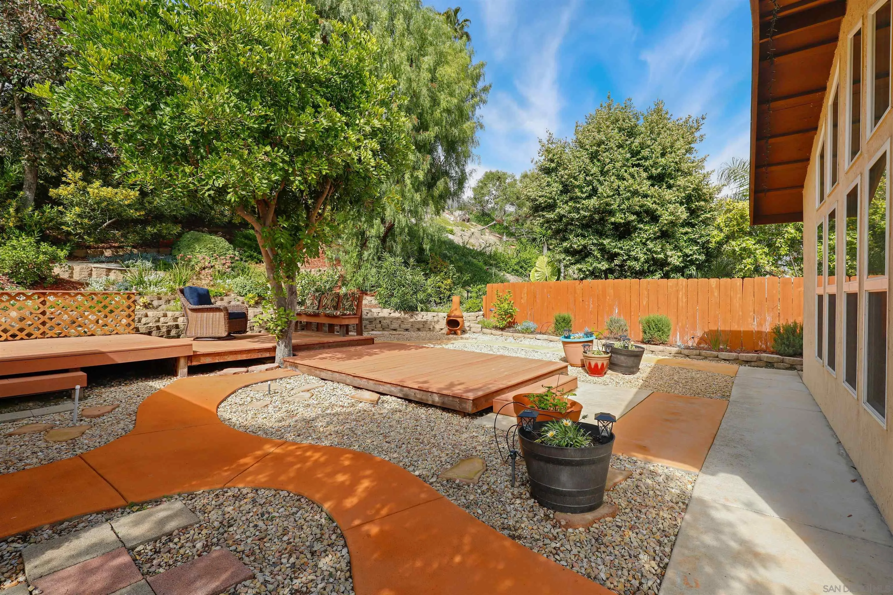 4716 Sunrise Ridge Oceanside, CA 92056 - Photo 26 of 31 a view of swimming pool with outdoor seating and plants